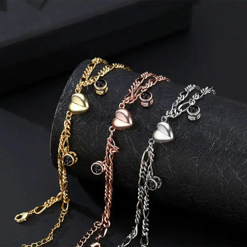 Gold, rose gold, and silver Couple Bracelets with heart design from My Store, featuring a Simple Projection 'I love you' in 100 languages.