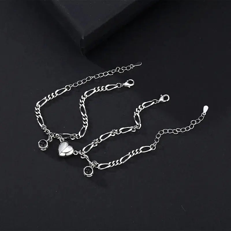 Beautiful silver Couple Bracelet set from My Store, highlighting the romantic 'I love you' projection in 100 languages.